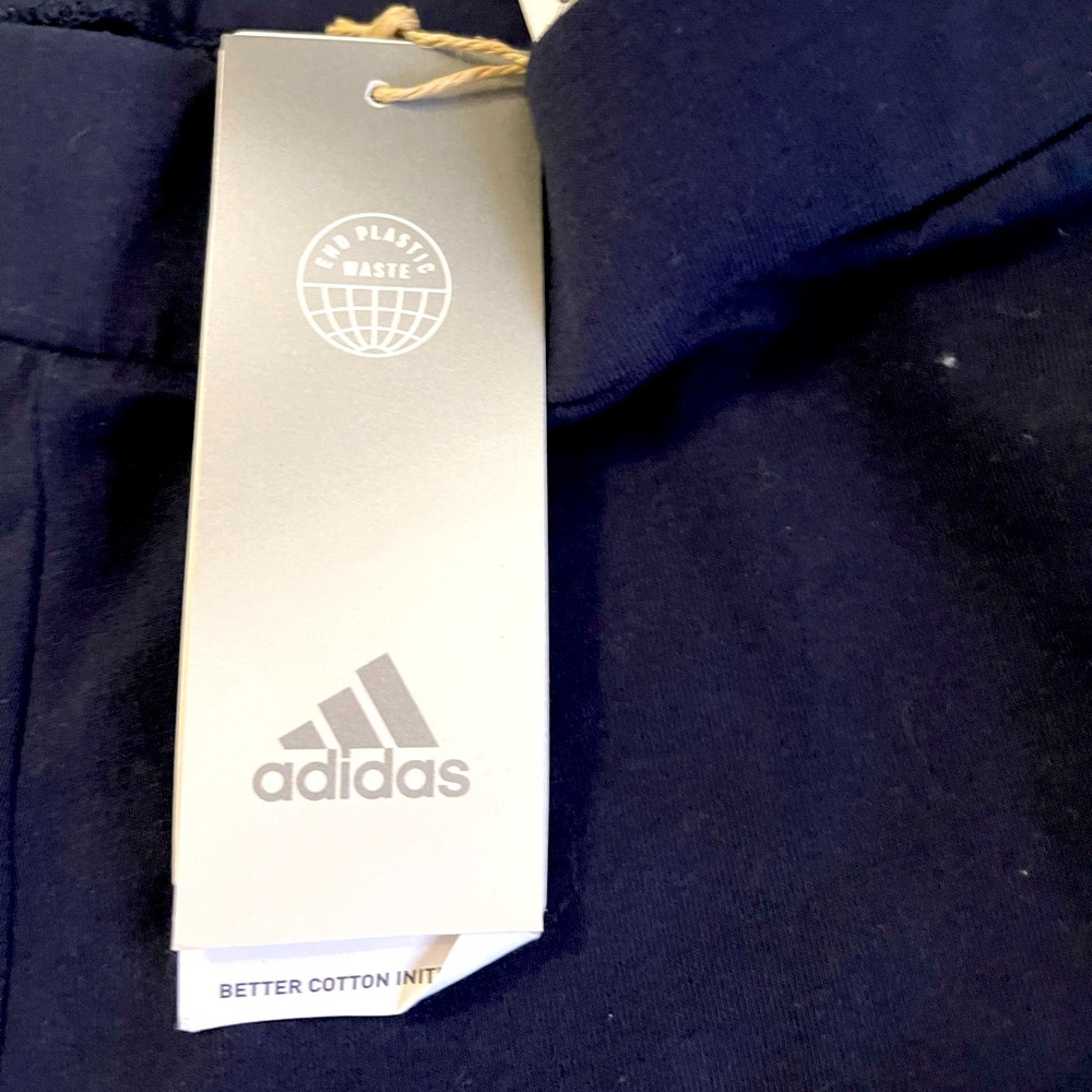 Black/ dark navy adidas leggings,  with light blue strip. Size small. Mid rise.